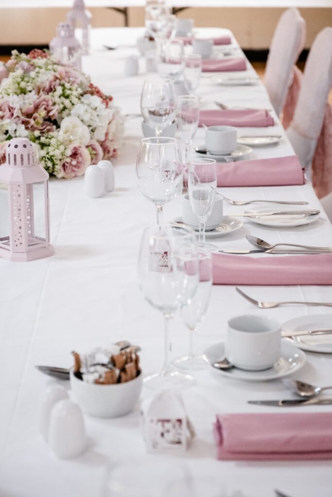 Dining Hall at Beverley Road Masonic Hall in Hull, decorated with elegant table settings, chair covers and centrepieces for a wedding breakfast.